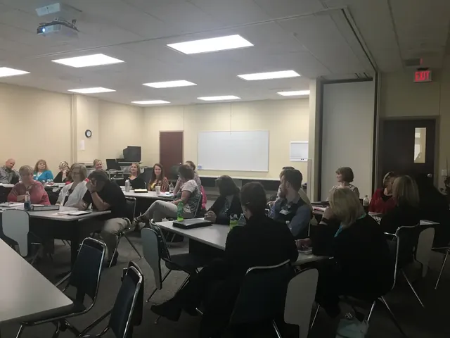 Participants listening during a group training session