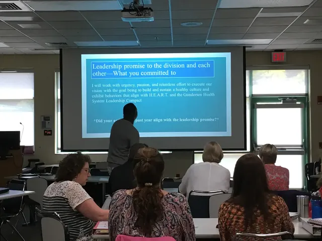 Audience watching a leadership presentation