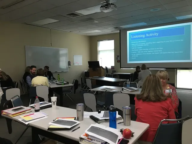 Participants gathered around tables during a leadership workshop