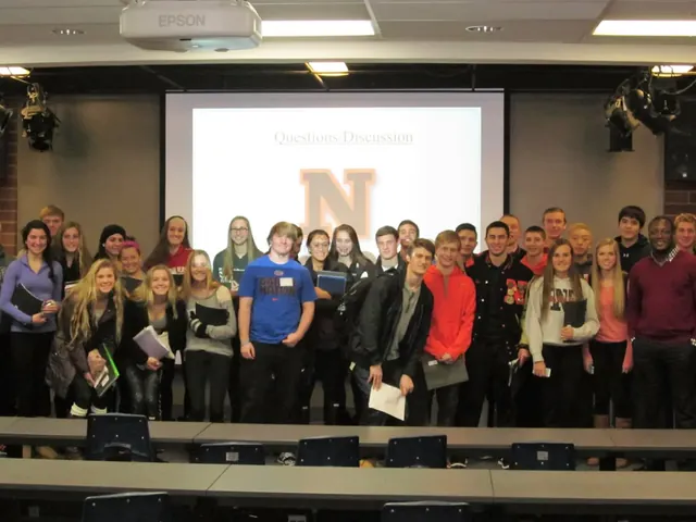 Group photograph in a classroom after a presentation