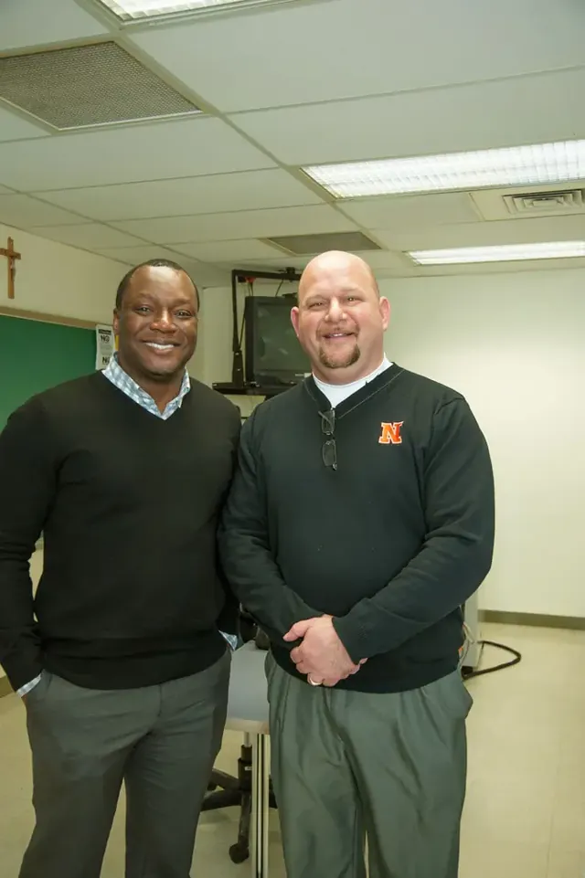 Kevin standing with a workshop participant